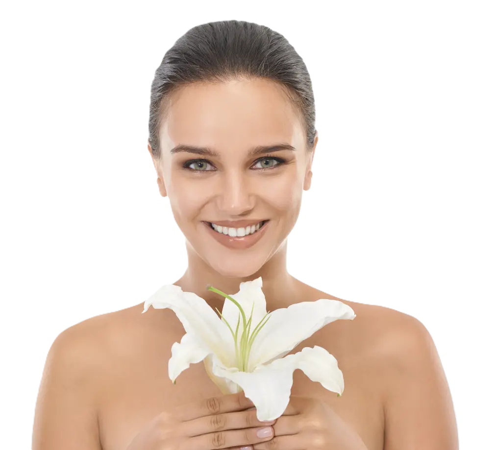 Spa therapist holding a white lily