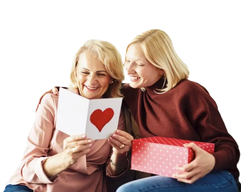 A woman sharing a spa gift card with her mother