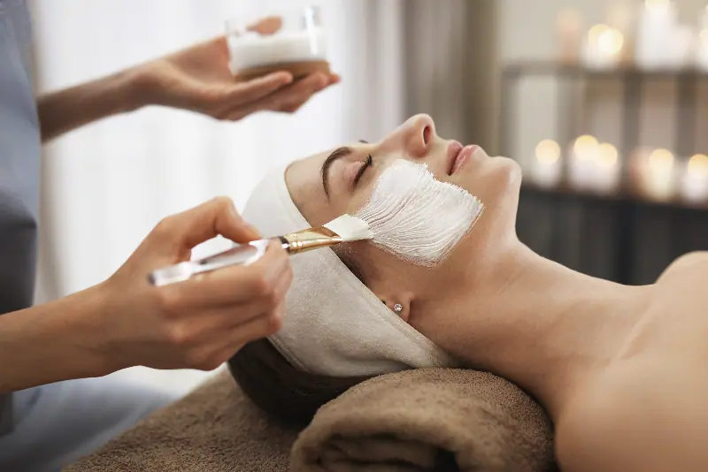 Guest receiving a refreshing facial mask treatment